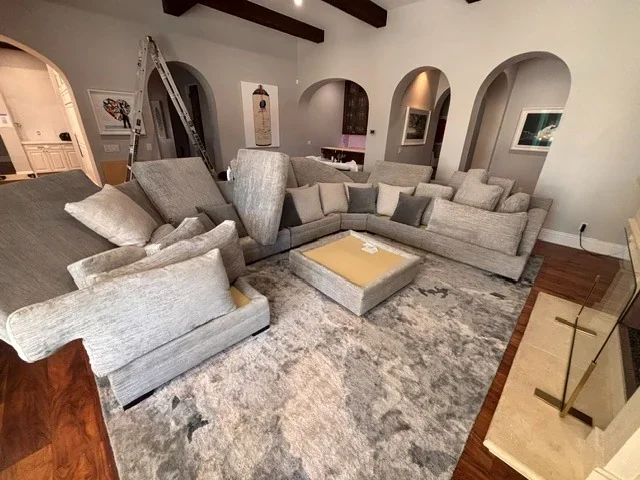 Large grey fabric sectional in a Scottsdale home prepared for cleaning